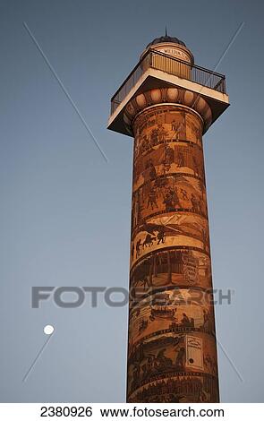Stock Photograph - The moon rises near the Astoria Column; Astoria, Oregon, United States of America. Fotosearch