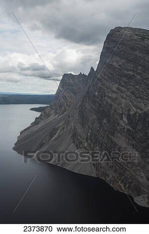Stock Image - The Ramparts of Little Doctor Lake; Northwest Territories, Canada. Fotosearch