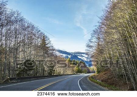 Stock Photograph - Travelling the island highway in winter; Vancouver Island, British Columbia, Canada. Fotosearch