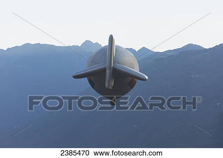 Stock Image - View of a blimp in the sky; Locarno, Ticino, Switzerland. Fotosearch