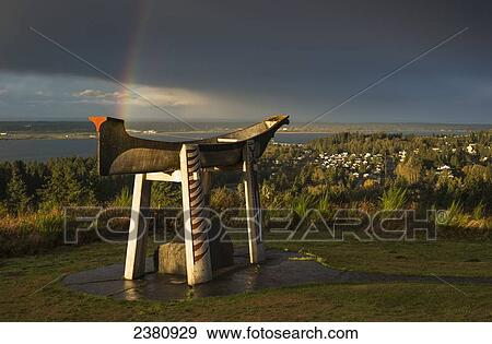 View of a rainbow coming out of the storm clouds from Coxcomb Hill; Astoria, Oregon, United States of America View Large Photo Image Stock Photo - View of a rainbow coming out of the storm clouds from Coxcomb Hill; Astoria, Oregon, United States of America. Fotosearch