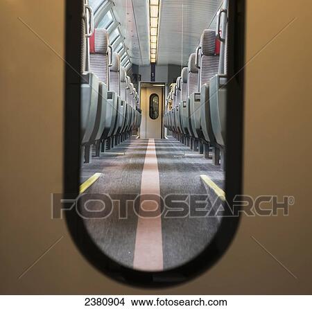 View of seating in a train through the window in a door; Locarno, Ticino, Switzerland View Large Photo Image Picture - View of seating in a train through the window in a door; Locarno, Ticino, Switzerland. Fotosearch