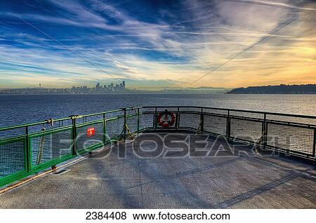 Stock Photo - View of Seattle from a Washington State Ferry; Seattle, Washington, United States of America. Fotosearch