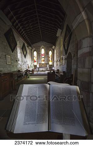 View of the interior of a church with stained glass windows and an open Bible; Bamburgh, Northumberland, England View Large Photo Image Stock Image - View of the interior of a church with stained glass windows and an open Bible; Bamburgh, Northumberland, England. Fotosearch