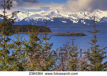 Picture - View of the mountains just north of Juneau from the Glacier Highway; Alaska, United States of America. Fotosearch