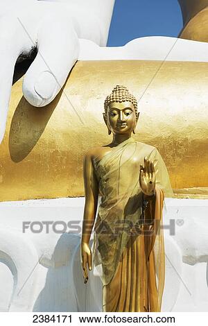 Stock Image - Wat Doi Kham Temple Buddha; Chiang Mai, Thailand. Fotosearch