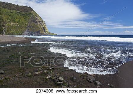 Stock Photo - Water coming on shore with the tide; Big Island, Hawaii, United States of America. Fotosearch