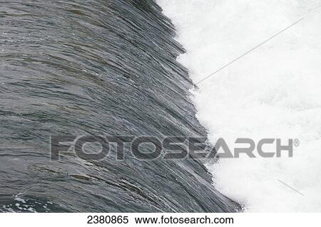 Water crashing over a waterfall; Whitehorse, Yukon, Canada View Large Photo Image Stock Photography - Water crashing over a waterfall; Whitehorse, Yukon, Canada. Fotosearch