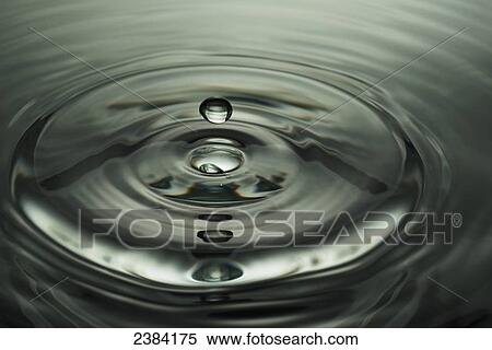Water droplet in the water; Chiang Mai, Thailand View Large Photo Image Stock Photography - Water droplet in the water; Chiang Mai, Thailand. Fotosearch