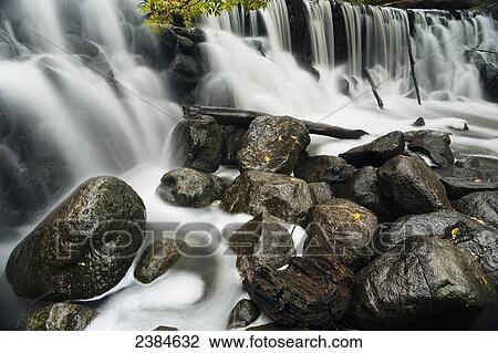 Stock Image - Waterfall in Hales Corners; Whitnall Park, Wisconsin, United States of America. Fotosearch