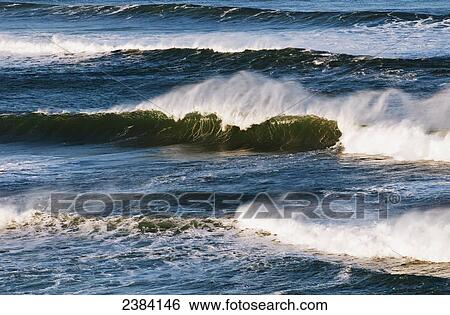 Stock Photograph - Waves breaking in the ocean; Cannon Beach, Oregon, United States of America. Fotosearch