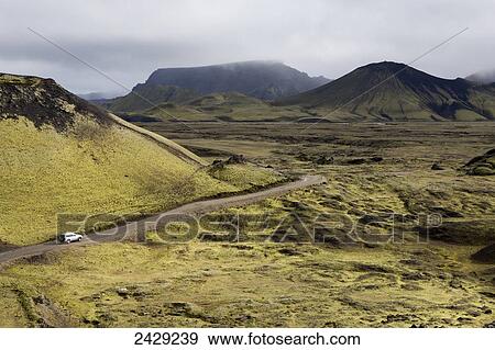 4 wheel drive vehicle driving down a remote road; Iceland View Large Photo Image Stock Photo - 4 wheel drive vehicle driving down a remote road; Iceland. Fotosearch