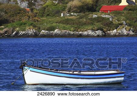 A canoe moored in a harbour, near Eyeries; County Cork, Ireland View Large Photo Image Stock Image - A canoe moored in a harbour, near Eyeries; County Cork, Ireland. Fotosearch