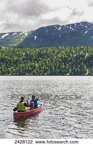 A couple and young girl in a red canoe on Byers lake with green forested shoreline and foothills in the background, Denali State Park; Alaska, United States of America View Large Photo Image Stock Image - A couple and young girl in a red canoe on Byers lake with green forested shoreline and foothills in the background, Denali State Park; Alaska, United States of America. Fotosearch
