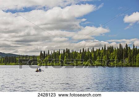 A couple and young girl in a red canoe on Byers lake with green forested shoreline, Byers Lake Campground, Denali State Park; Alaska, United States of America View Large Photo Image Stock Image - A couple and young girl in a red canoe on Byers lake with green forested shoreline, Byers Lake Campground, Denali State Park; Alaska, United States of America. Fotosearch