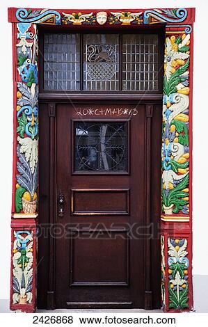 A door with colourful ornate walls painted around the frame; Nassau, Rheinland-Pfalz, Germany View Large Photo Image Stock Photo - A door with colourful ornate walls painted around the frame; Nassau, Rheinland-Pfalz, Germany. Fotosearch