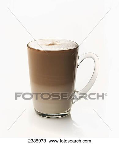 A glass mug with a foamy coffee drink against a white background View Large Photo Image Stock Photo - A glass mug with a foamy coffee drink against a white background. Fotosearch