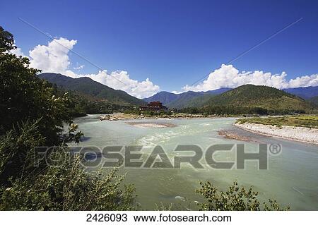 A river with mountains, blue sky and cloud; Punakha, Bhutan View Large Photo Image Stock Image - A river with mountains, blue sky and cloud; Punakha, Bhutan. Fotosearch