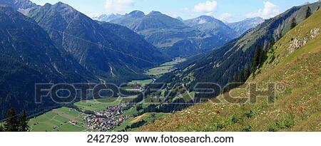 Stock Photo - A town in a valley; Holzgau im Lechtal, Tirol, Austrial. Fotosearch