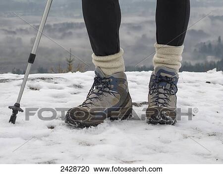 A woman hikes in the snow on the hills of Vancouver Island; Duncan, British Columbia, Canada View Large Photo Image Stock Image - A woman hikes in the snow on the hills of Vancouver Island; Duncan, British Columbia, Canada. Fotosearch