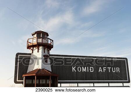 A wooden sign with lighthouse saying Komid Aftur in Hecla-Grindstone Provincial Park; Manitoba, Canada View Large Photo Image Stock Photography - A wooden sign with lighthouse saying Komid Aftur in Hecla-Grindstone Provincial Park; Manitoba, Canada. Fotosearch