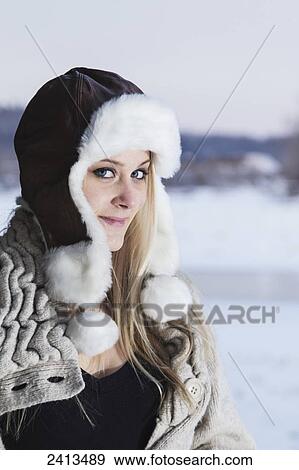 A young woman in winter fashion attire; Fort McMurray, Alberta, Canada View Large Photo Image Stock Photo - A young woman in winter fashion attire; Fort McMurray, Alberta, Canada. Fotosearch