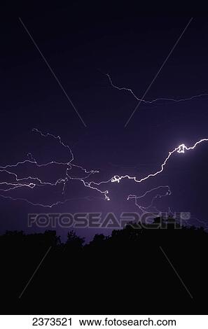 Stock Image - Agriculture - Cloud to cloud lightning strike over rural landscape / Northwest Missouri, USA.. Fotosearch