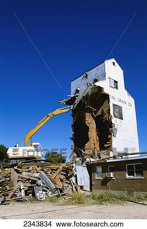 Agriculture - Demolition of an old wooden grain elevator / Shabbona, Illinois, USA. View Large Photo Image Picture - Agriculture - Demolition of an old wooden grain elevator / Shabbona, Illinois, USA.. Fotosearch