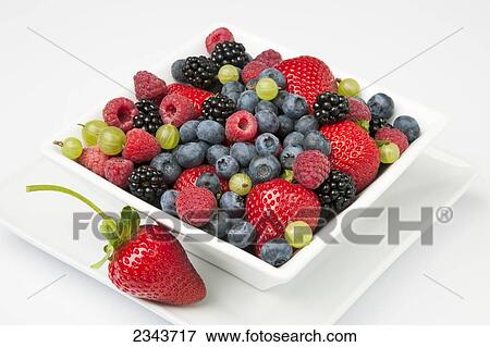 Agriculture - Fresh strawberries, red raspberries, blackberries, blueberries and gooseberries in a white bowl on a white surface. View Large Photo Image Stock Photo - Agriculture - Fresh strawberries, red raspberries, blackberries, blueberries and gooseberries in a white bowl on a white surface.. Fotosearch