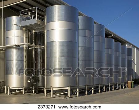 Agriculture - Large modern aluminum wine fermentation tanks at a winery / Lodi, San Joaquin County, California, USA. View Large Photo Image Stock Image - Agriculture - Large modern aluminum wine fermentation tanks at a winery / Lodi, San Joaquin County, California, USA.. Fotosearch