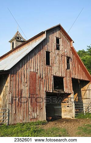 Agriculture - Old red wooden barn falling into disrepair / near England, Arkansas, USA. View Large Photo Image Stock Image - Agriculture - Old red wooden barn falling into disrepair / near England, Arkansas, USA.. Fotosearch
