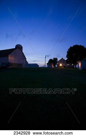 Stock Photo - Agriculture - View of a midwestern farmyard at dawn / near Northland, Minnesota, USA.. Fotosearch