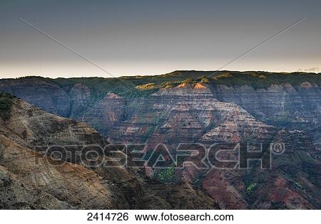 Stock Photograph - Amazing colours found at Waimea Canyon; Kauai, Hawaii, United States of America. Fotosearch