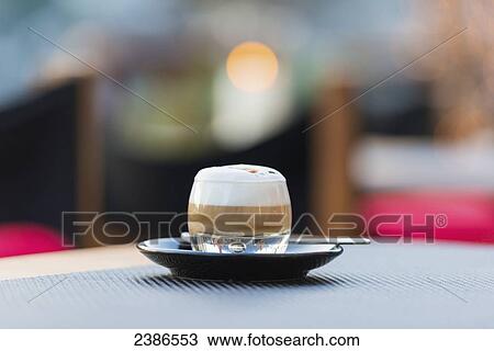 An espresso drink with foam; Ascona, Ticino, Switzerland View Large Photo Image Stock Image - An espresso drink with foam; Ascona, Ticino, Switzerland. Fotosearch