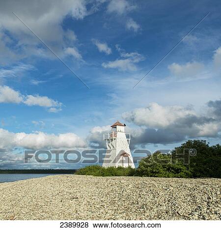 An old white lighthouse on the shore of Lake Winnipeg in Hecla-Grindstone Provincial Park; Manitoba, Canada View Large Photo Image Stock Photo - An old white lighthouse on the shore of Lake Winnipeg in Hecla-Grindstone Provincial Park; Manitoba, Canada. Fotosearch