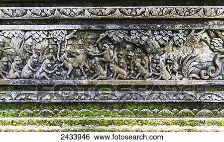 Bas-relief featuring monkeys on Pura Dalem Agung Padangtegal, or Padangtegal Great Temple of Death in the Sacred Monkey Forest of Padangtegal, Ubud, Bali, Indonesia View Large Photo Image Stock Photograph - Bas-relief featuring monkeys on Pura Dalem Agung Padangtegal, or Padangtegal Great Temple of Death in the Sacred Monkey Forest of Padangtegal, Ubud, Bali, Indonesia. Fotosearch