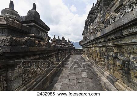 Bas-reliefs depicting the life of Buddha on a gallery of Candi Borubudur, Borobudur Temple Compounds, Central Java, Indonesia View Large Photo Image Stock Photography - Bas-reliefs depicting the life of Buddha on a gallery of Candi Borubudur, Borobudur Temple Compounds, Central Java, Indonesia. Fotosearch