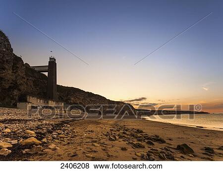 Beach along the coastline at sunset; South Shields, Tyne and Wear, England View Large Photo Image Stock Photo - Beach along the coastline at sunset; South Shields, Tyne and Wear, England. Fotosearch