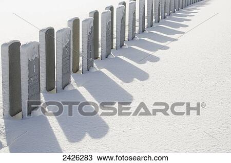 Stock Image - Burnsland Cemetery in winter; Calgary, Alberta, Canada. Fotosearch