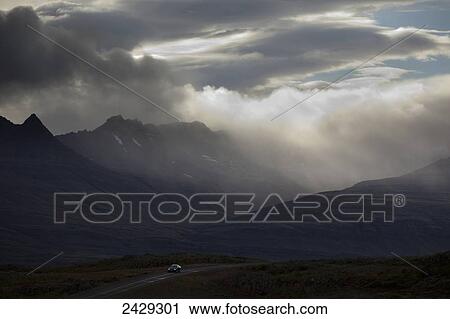 Car driving on the Number 1 Icelandic on the Southeast section of Iceland during a rugged storm; Iceland View Large Photo Image Stock Image - Car driving on the Number 1 Icelandic on the Southeast section of Iceland during a rugged storm; Iceland. Fotosearch