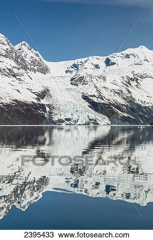 Cascade Glacier and Chugach Mountains reflected in the waters of Barry Arm, Chugach National Forest; Alaska, United States of America View Large Photo Image Stock Image - Cascade Glacier and Chugach Mountains reflected in the waters of Barry Arm, Chugach National Forest; Alaska, United States of America. Fotosearch