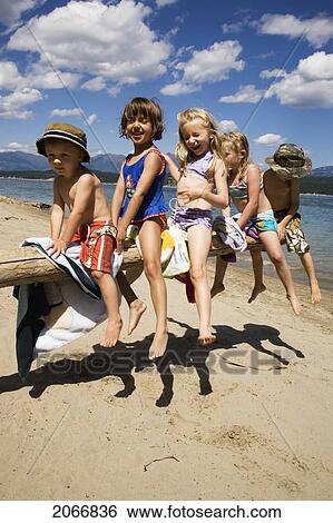 Children Playing On Beach On Lake Koocanusa In The East Kootenays Near Fernie, British Columbia, Canada View Large Photo Image Stock Photograph - Children Playing On Beach On Lake Koocanusa In The East Kootenays Near Fernie, British Columbia, Canada. Fotosearch