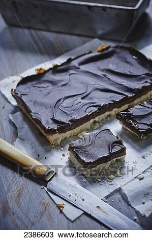 Stock Image - Chocolate shortbread millionaire bars. Fotosearch
