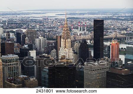 Chrysler Building amidst skyscrapers at dusk, as seen from the Empire State Building, New York City, New York, United States View Large Photo Image Stock Image - Chrysler Building amidst skyscrapers at dusk, as seen from the Empire State Building, New York City, New York, United States. Fotosearch