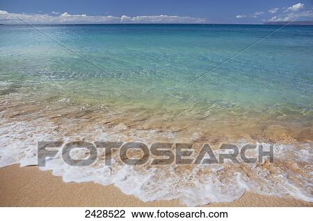 Clear blue water at Makena's Big Beach; Maui, Hawaii, United States of America View Large Photo Image Stock Image - Clear blue water at Makena's Big Beach; Maui, Hawaii, United States of America. Fotosearch