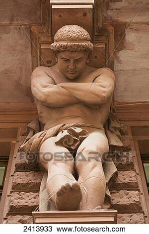 Close up of a stone carved statue of a man with arms crossed; Frankfurt am Main, Germany View Large Photo Image Stock Image - Close up of a stone carved statue of a man with arms crossed; Frankfurt am Main, Germany. Fotosearch