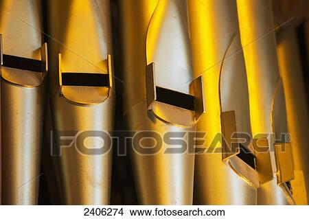 Close up of the gold pipes of a pipe organ; Northumberland, England View Large Photo Image Picture - Close up of the gold pipes of a pipe organ; Northumberland, England. Fotosearch