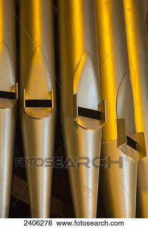 Close up of the gold pipes of a pipe organ; Northumberland, England View Large Photo Image Stock Photo - Close up of the gold pipes of a pipe organ; Northumberland, England. Fotosearch