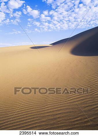 Clouds drift over the Umpqua Dunes; Lakeside, Oregon, United States of America View Large Photo Image Picture - Clouds drift over the Umpqua Dunes; Lakeside, Oregon, United States of America. Fotosearch
