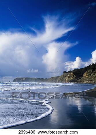 Stock Photograph - Clouds move in over Cape Blanco; Port Orford, Oregon, United States of America. Fotosearch